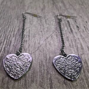 Black tone heart dangle earrings